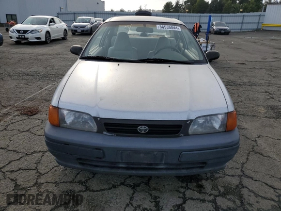 1996 Toyota Tercel DX z VIN JT2AC52L2T0137695, wystawiony jako Copart lot #86535844 z przebiegiem 246 554 mil mil oraz Czysty tytuł • Clean title. Historia ofert i sprzedaży dostępna na DreamBid. Obrazek 5.