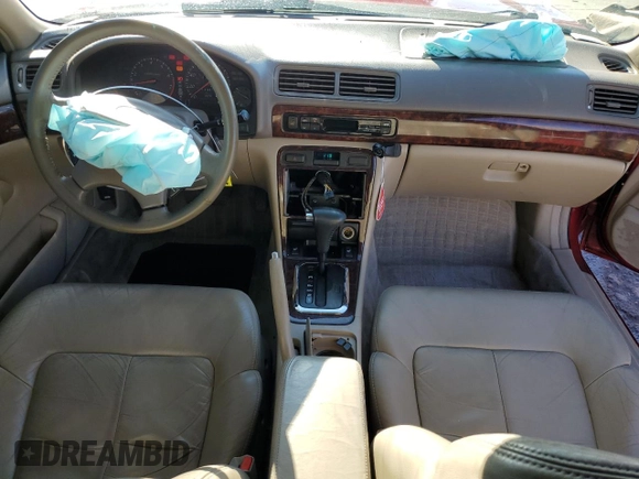 1998 Acura CL Premium z VIN 19UYA2253WL001513, wystawiony jako Copart lot #86998034 z przebiegiem 123 918 mil mil oraz Szkody całkowita. Historia ofert i sprzedaży dostępna na DreamBid. Obrazek 8.
