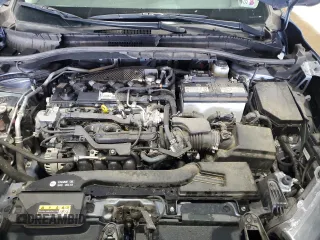 2023 Toyota Corolla Cross LE z VIN 7MUBAAAG4PV042580, wystawiony jako Copart lot #60788025 z przebiegiem 59 576 mil mil oraz Szkoda całkowita • Salvage title. Historia ofert i sprzedaży dostępna na DreamBid. Obrazek 12.