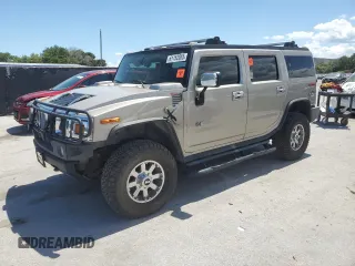 2003 Hummer H2 z VIN 5GRGN23U33H142552, wystawiony jako Copart lot #61152055 z przebiegiem Nie podano mil oraz Czysty tytuł • Clean title. Historia ofert i sprzedaży dostępna na DreamBid. Obrazek 1.