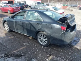 2014 Toyota Camry SE with VIN 4T1BK1FK3EU537670, listed as a IAAI auction lot 41649097 with 64,636 mi miles. Bid and sale history available at carsss.com. Image 3.