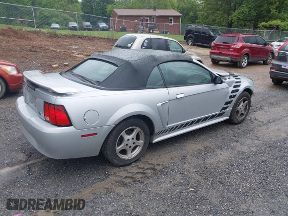 2002 Ford Mustang Deluxe z VIN 1FAFP44492F221578, wystawiony jako IAAI lot #42242232 z przebiegiem 107 773 mil mil oraz . Historia ofert i sprzedaży dostępna na DreamBid. Obrazek 4.