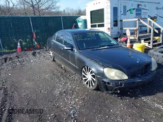 2004 Mercedes-Benz S-Class 5.0L with VIN WDBNG75J24A414813, listed as a IAAI auction lot 41911565 with 999,999 mi miles. Bid and sale history available at carsss.com. Image 1.