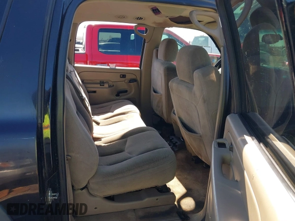 2005 Chevrolet Suburban LS z VIN 3GNEC16Z25G158598, wystawiony jako IAAI lot #41266791 z przebiegiem 237 191 mil mil oraz . Historia ofert i sprzedaży dostępna na DreamBid. Obrazek 8.