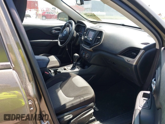 2015 Jeep Cherokee Sport with VIN 1C4PJMAB9FW595102, listed as a IAAI auction lot 42257918 with 95,059 mi miles and . Bid and sale history available at DreamBid. Image 5.