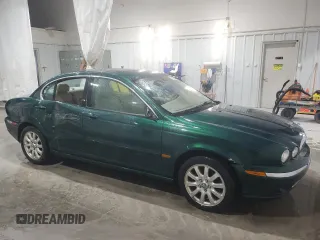 2003 Jaguar X-Type 2.5L Manual z VIN SAJEA51D63XD54591, wystawiony jako Copart lot #57638355 z przebiegiem Nie podano mil oraz Szkody całkowita. Historia ofert i sprzedaży dostępna na DreamBid. Obrazek 4.