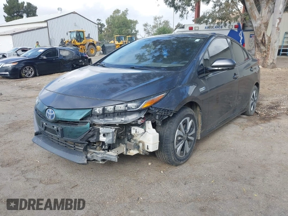 2018 Toyota Prius Plus with VIN JTDKARFPXJ3104302, listed as a IAAI auction lot 42127312 with 87,531 mi miles and . Bid and sale history available at DreamBid. Image 19.