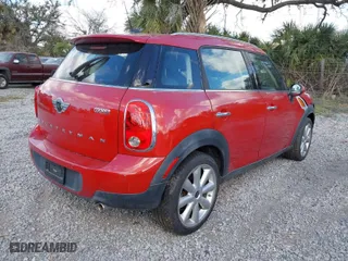 2014 MINI Cooper Countryman with VIN WMWZB3C54EWR39969, listed as a IAAI auction lot 41188222 with NaN miles. Bid and sale history available at carsss.com. Image 4.
