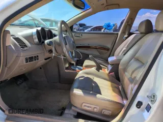 2004 Nissan Maxima SE with VIN 1N4BA41E24C883438, listed as a Copart auction lot 56175265 with 122,747 mi miles and Salvage title. Bid and sale history available at DreamBid. Image 7.