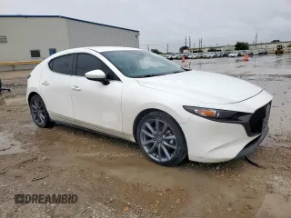 2019 Mazda 3 with VIN JM1BPBJM2K1136404, listed as a Copart auction lot 60378665 with 61,903 mi miles and Salvage title. Bid and sale history available at DreamBid. Image 4.
