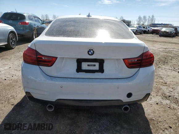 2016 BMW 4 Series 435i xDrive z VIN WBA4B3C59GG344557, wystawiony jako Copart lot #53164045 z przebiegiem 99 094 mil mil oraz Szkoda całkowita • Salvage title. Historia ofert i sprzedaży dostępna na DreamBid. Obrazek 6.