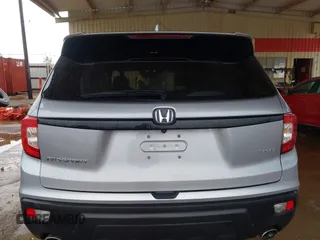 2021 Honda Passport Sport with VIN 5FNYF7H26MB014556, listed as a IAAI auction lot 41683680 with 97,829 mi miles and . Bid and sale history available at carsss.com. Image 16.