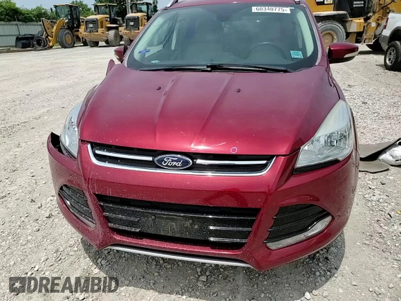 2015 Ford Escape Titanium with VIN 1FMCU0JX5FUC90567, listed as a Copart auction lot 60340775 with 67,287 mi miles and Salvage title. Bid and sale history available at DreamBid. Image 14.