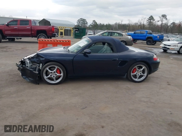 2003 Porsche Boxster S с VIN WP0CB29853U662035, выставлен на аукционе IAAI как лот 41845536 с пробегом 42 026 миль миль и . История ставок и продаж доступна на DreamBid. Изображение 14.