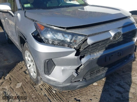2019 Toyota RAV4 LE with VIN JTMG1RFV2KD013394, listed as a IAAI auction lot 41449622 with 64,811 mi miles. Bid and sale history available at carsss.com. Image 6.