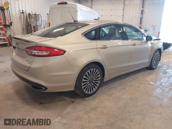 2018 Ford Fusion Titanium с VIN 3FA6P0D9XJR246737, выставлен на аукционе IAAI как лот 42274631 с пробегом 88 247 миль миль и . История ставок и продаж доступна на DreamBid. Изображение 4.