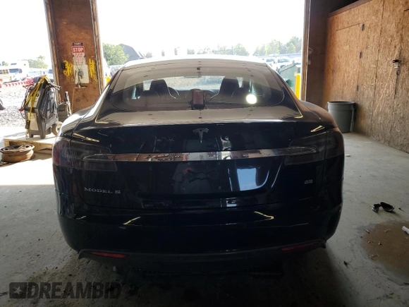 2014 Tesla Model S 60 with VIN 5YJSA1H16EFP43523, listed as a Copart auction lot 63291145 with Not provided miles and Clean title. Bid and sale history available at DreamBid. Image 6.