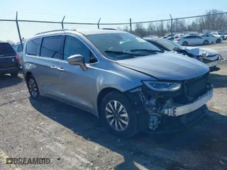 2021 Chrysler Pacifica Hybrid Touring L with VIN 2C4RC1L77MR594630, listed as a IAAI auction lot 41739229 with 79,556 mi miles. Bid and sale history available at carsss.com. Image 1.