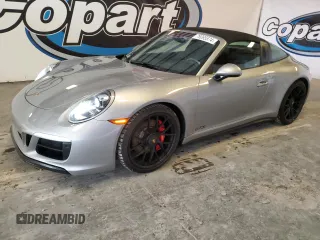 2019 Porsche 911 4S with VIN WP0BB2A92KS125505, listed as a Copart auction lot 76065574 with 37,305 mi miles and Salvage Title. Bid and sale history available at DreamBid. Image 1.