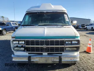 1994 Chevrolet Chevy Van z VIN 1GBEG25KXRF155175, wystawiony jako Copart lot #46681995 z przebiegiem 217 446 mil mil oraz Szkoda całkowita • Salvage title. Historia ofert i sprzedaży dostępna na DreamBid. Obrazek 5.