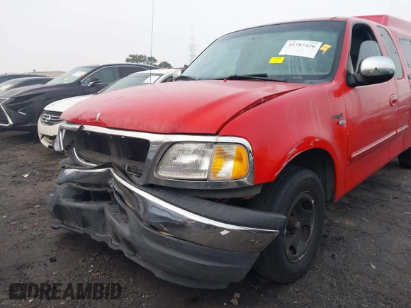 1999 Ford F-150 z VIN 1FTRX17WXXNA90516, wystawiony jako IAAI lot #41787426 z przebiegiem 354 066 mil mil oraz . Historia ofert i sprzedaży dostępna na DreamBid. Obrazek 6.