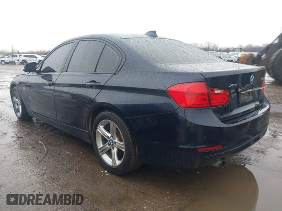 2015 BMW 3 Series 320i xDrive with VIN WBA3C3C57FP664631, listed as a IAAI auction lot 41117730 with 102,555 mi miles and . Bid and sale history available at DreamBid. Image 3.