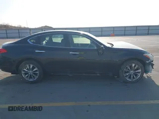 2013 Infiniti M with VIN JN1BY1AR3DM600436, listed as a IAAI auction lot 42031696 with 114,637 mi miles and . Bid and sale history available at DreamBid. Image 13.