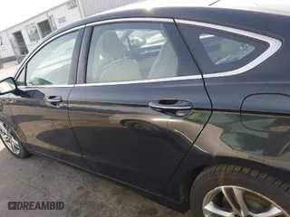 2015 Ford Fusion Energi Titanium with VIN 3FA6P0SU8FR189159, listed as a IAAI auction lot 41595744 with 170,558 mi miles. Bid and sale history available at carsss.com. Image 14.
