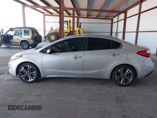 2016 Kia Forte EX with VIN KNAFX4A81G5528190, listed as a IAAI auction lot 42142075 with 162,056 mi miles. Bid and sale history available at carsss.com. Image 14.