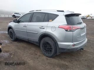 2018 Toyota RAV4 LE with VIN 2T3BFREV9JW724606, listed as a IAAI auction lot 41862028 with 98,590 mi miles. Bid and sale history available at carsss.com. Image 3.