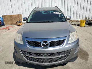 2012 Mazda CX-9 Grand Touring z VIN JM3TB3DV3C0335330, wystawiony jako Copart lot #57562015 z przebiegiem 171 397 mil mil oraz Szkody całkowita. Historia ofert i sprzedaży dostępna na DreamBid. Obrazek 5.