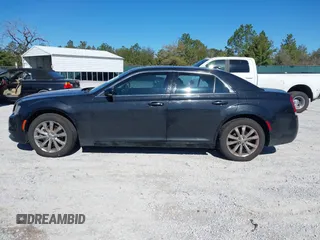 2015 Chrysler 300 Limited with VIN 2C3CCARG9FH838420, listed as a IAAI auction lot 41684228 with 242,316 mi miles. Bid and sale history available at carsss.com. Image 14.