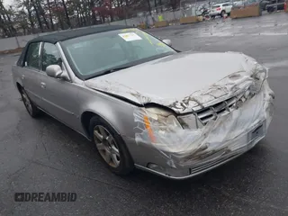 2007 Cadillac DTS Luxury I z VIN 1G6KD57Y47U183429, wystawiony jako IAAI lot #41132029 z przebiegiem 100 862 mil mil oraz . Historia ofert i sprzedaży dostępna na DreamBid. Obrazek 1.