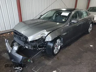 2016 Jaguar XJ Portfolio with VIN SAJWJ2GD7G8W02919, listed as a IAAI auction lot 41490211 with 170,768 mi miles and . Bid and sale history available at DreamBid. Image 2.