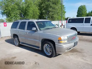 2005 GMC Yukon Denali z VIN 1GKEK63U55J266766, wystawiony jako IAAI lot #42430195 z przebiegiem Nie podano mil oraz . Historia ofert i sprzedaży dostępna na DreamBid. Obrazek 1.