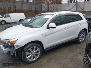 2015 Mitsubishi Outlander Sport SE with VIN 4A4AR4AU4FE049810, listed as a IAAI auction lot 41559358 with 107,644 mi miles. Bid and sale history available at carsss.com. Image 17.