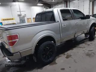 2011 Ford F-150 XL with VIN 1FTFW1EF7BFC77207, listed as a IAAI auction lot 41491587 with 168,207 mi miles. Bid and sale history available at carsss.com. Image 4.