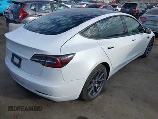 2022 Tesla Model 3 with VIN 5YJ3E1EA8NF210196, listed as a IAAI auction lot 41674407 with 24,270 mi miles. Bid and sale history available at carsss.com. Image 4.
