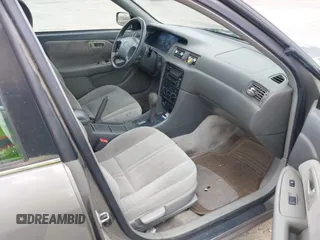 2001 Toyota Camry CE z VIN 4T1BG22K31U069222, wystawiony jako IAAI lot #42346667 z przebiegiem 197 423 mil mil oraz . Historia ofert i sprzedaży dostępna na DreamBid. Obrazek 5.