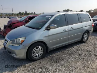 2006 Honda Odyssey EX-L z VIN 5FNRL38756B087695, wystawiony jako Copart lot #60122525 z przebiegiem 213 221 mil mil oraz Szkoda całkowita • Salvage title. Historia ofert i sprzedaży dostępna na DreamBid. Obrazek 1.