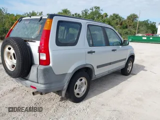 2004 Honda CR-V LX with VIN SHSRD68464U202458, listed as a IAAI auction lot 42046480 with 149,343 mi miles and . Bid and sale history available at carsss.com. Image 4.
