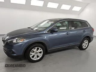 2014 Mazda CX-9 Sport с VIN JM3TB2BA1E0446326, выставлен на аукционе Copart как лот 57448355 с пробегом 115 290 миль миль и Чистый • Clean title. История ставок и продаж доступна на DreamBid. Изображение 1.