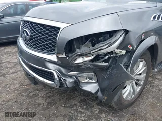 2017 Infiniti QX80 with VIN JN8AZ2NE1H9151466, listed as a IAAI auction lot 41813407 with 82,428 mi miles. Bid and sale history available at carsss.com. Image 6.
