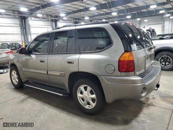 2005 GMC Envoy SLE with VIN 1GKDS13S252229262, listed as a Copart auction lot 51214685 with 117,256 mi miles and Salvage Title. Bid and sale history available at carsss.com. Image 2.