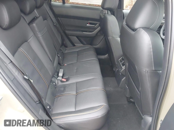 2025 Mazda CX-50 Premium z VIN 7MMVABDY2SN339010, wystawiony jako IAAI lot #42201002 z przebiegiem 36 mil mil oraz . Historia ofert i sprzedaży dostępna na DreamBid. Obrazek 8.