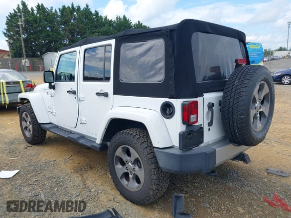 2018 Jeep Wrangler Unlimited Altitude with VIN 1C4HJWEGXJL870606, listed as a IAAI auction lot 42693031 with 92,735 mi miles and . Bid and sale history available at DreamBid. Image 3.