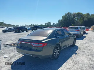 2017 Lincoln Continental Select with VIN 1LN6L9TK1H5617355, listed as a IAAI auction lot 40404909 with 108,208 mi miles and . Bid and sale history available at DreamBid. Image 4.