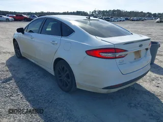 2018 Ford Fusion S with VIN 3FA6P0G7XJR216535, listed as a IAAI auction lot 41640799 with 183,932 mi miles. Bid and sale history available at carsss.com. Image 3.