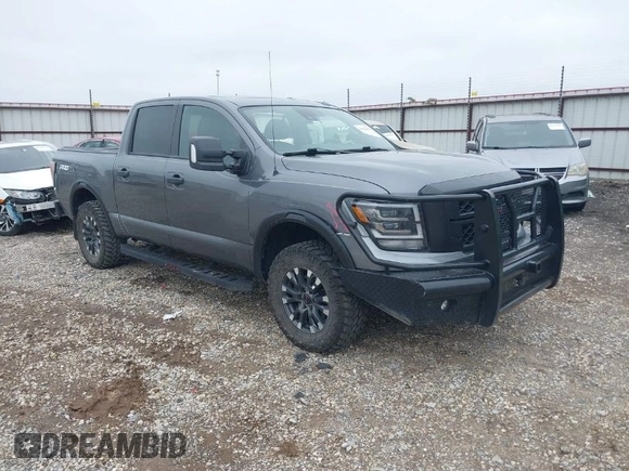2021 Nissan Titan Pro-4X with VIN 1N6AA1ED3MN531332, listed as a IAAI auction lot 41918065 with 125,323 mi miles and . Bid and sale history available at DreamBid. Image 1.