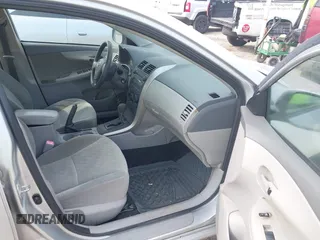 2009 Toyota Corolla with VIN JTDBL40EX9J029628, listed as a IAAI auction lot 42111711 with 168,226 mi miles. Bid and sale history available at carsss.com. Image 5.